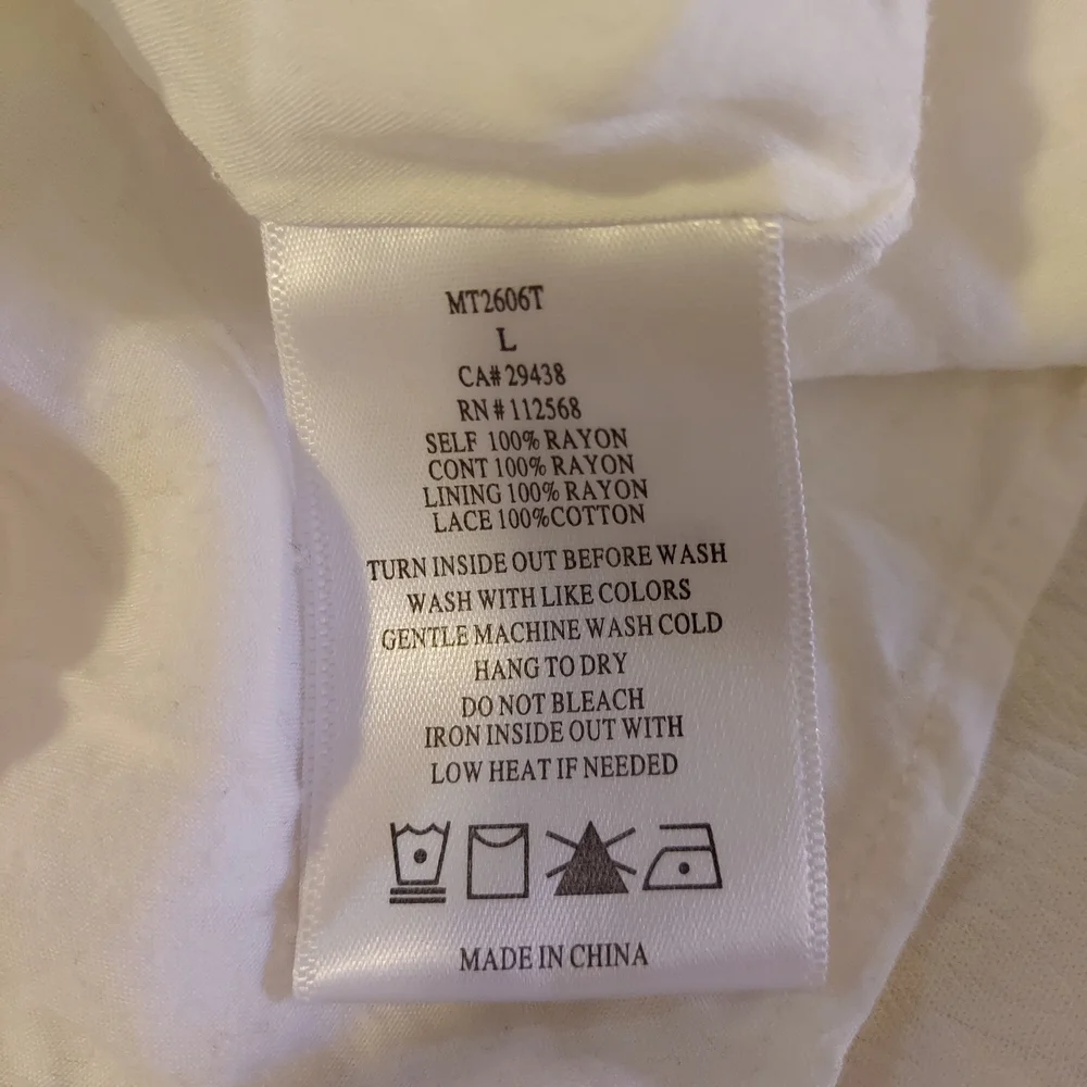 Miss Me Cream Boho Flowy Feminine Sleeveless Blouse With Tassel Ties - Picture 4 of 9